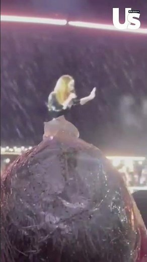 Adele Performs 'Set Fire to the Rain' Live in the Rain