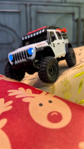 CrawlerTrax on Instagram: "🎄 A Little RC Christmas Magic | Our Gift to the RC Community This one’s for the RC community. 🎁 This Christmas short is our way of saying thank you for the support, the builds, the creativity, and the passion you bring to the hobby. From a model train delivering a special package, to an RC trackhoe setting it in place, and two Axial SCX32s rolling out to put the presents to the test—this is pure RC holiday fun. As our gift to you, enjoy 15% OFF your ord