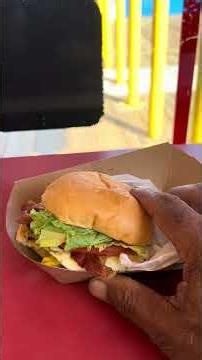 Eating the Santa Monica Pier Breakfast Burger and Chocolate Shake.