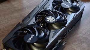 Download Powerful brand new NVidia GeForce RTX 3080 graphics card unboxed before installing into gaming PC. Fingers touch and rotate card cooling system fan. Computer hardware. Odessa, Ukraine 12 13 2020