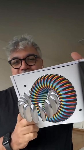 Watch art leap off the page!  This innovative book features: • 26 interactive 3D augmented reality artworks  • No app needed - just scan & watch magic happen  • Perfect for all ages & stunning coffee table display ☕ #AugmentedReality #InteractiveArt #TechMeetsDesign | Tyrell Wiker Kay | Facebook