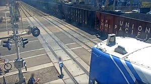 Surveillance video shows moments just before FrontRunner train fatally hits woman - KSLTV.com
