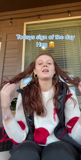 Hug in ASL: Learn the Sign of the Day