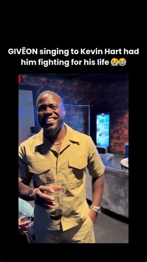Celebrity Media on Instagram: "Kevin Hart’s hilarious and emotional reaction to GIVĒON singing instantly became a viral pop culture moment that fans can’t stop replaying. As GIVĒON delivered his signature deep, soulful vocals, the camera cut to Kevin Hart, whose over-the-top facial expressions perfectly captured what everyone in the room was feeling. The contrast between GIVĒON’s smooth, emotional performance and Kevin’s exaggerated, stunned reaction made the clip comedy gold and quickly spread 