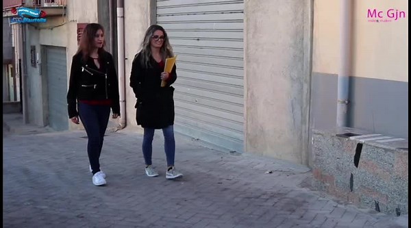 Urban Exploration: Women Interacting with Intercom and Gate