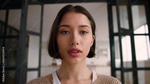 Webcam view concentrated Hispanic woman at home typing on mobile phone texting screen Latino Caucasian addicted girl user influencer touchscreen message touch smartphone display chatting gadget addict