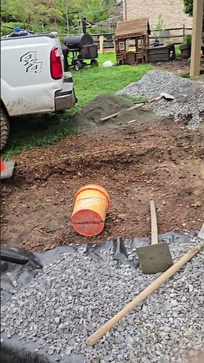 installing versa-lok block retaining wall with a radius to hold back a new stone pavor patio#art#job