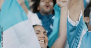 Soccer fans cheering for national team at the stadium