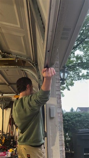 Replacing this worn-out garage door seal to help keep out water, drafts, dirt, and unwanted pests