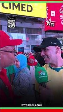 Moroccan fan jokes with a Brazilian fan and gifts him the Moroccan flag
