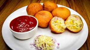 Bread Cheese Balls are a crisp and crunchy party snack with the melted cheese heaven inside. Cheese Balls are easy-to-prepare tasty snack. These Cheese Balls called by name Cheese puffs, cheese curls, cheesy puffs or corn curls. | Bhoomi's Quick Recipes