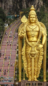 Ancient rocks, divine legends, and colors you’ve never imagined await! With the collaboration of Fabulous Travel & Tours, Batu Caves in Kuala Lumpur is a surreal blend of nature, faith, and color. Hidden in 400-million-year-old limestone hills, this Hindu temple—built in 1890 for Lord Kartikeya—welcomes visitors with 272 vibrant steps, playful monkeys, and divine carvings bathed in ritual offerings. . . . #Vlogumentary #BatuCaves #Malaysia #HinduTemple #KualaLumpur #Destinations | Vlogumentary -