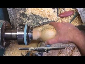Hand woodturning a sphere