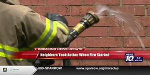 Two firefighters injured in Lansing townhouse fire