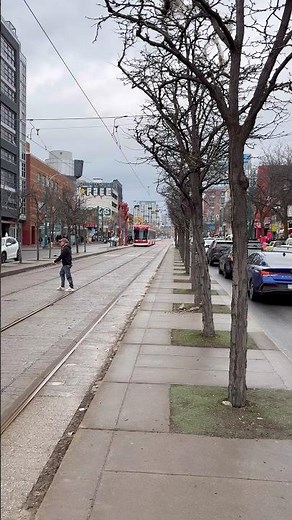 Toronto life🇨🇦 A Streetcar Rolling Through Downtown Toronto 🚋 #toronto #travel#streetcar #transit