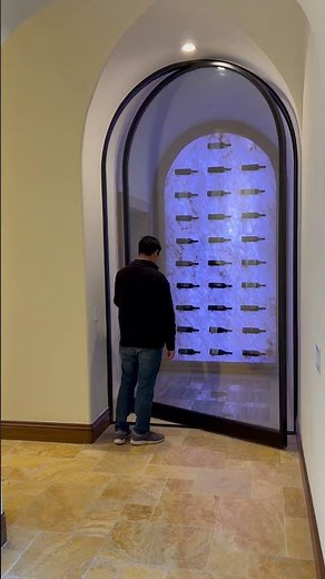 Wine cellar door by Juneau Architects & Steel Traditions - FritsJurgens Best Pivot Door Contest 2024