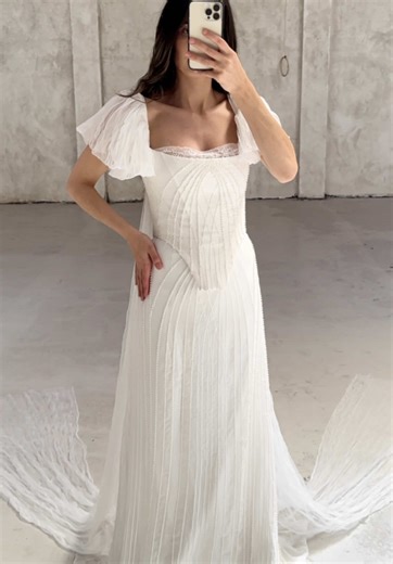 GENEVIEVE’s Otherworldly Bridal Silhouette