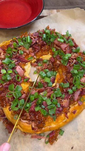 Smoked Boudin King Cake @HymelsKajunKitchen Recipes 1 LB boudin 8 ounces pepper jack cheese, shredded (2) 8-ounce cans Crescent Rolls 4 ounces of cream cheese 1 pound bacon, fried until crispy 1 jar Tabasco Pepper Jelly Steen’s 100% Pure Cane Syrup 1 bunch green onions, diced Preheat the oven to 350º. Prepare 2 baking sheets by covering them with parchment paper. 1. Open a can of Crescent Rolls and flatten with roller. 2. Remove and discard the casing from your boudin links with a knife. Mix che