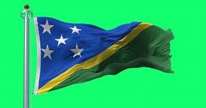 National Flag Solomon Islands Waving Wind Isolated Green Background Seamless