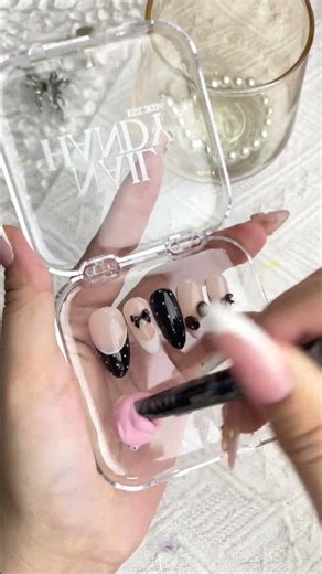 Black French bow press-on nails #BlackFrenchNails #PressOnNails #nailart #nailtips #pressonnail