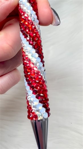The Blinging Bluebird on Instagram: "I am still completely obsessed with creating these ombre swirl pens. There is just something so soothing about watching the pattern come together. I have a few more up my sleeve that I cannot wait to share… but for today, here is this beautiful red beauty I just finished. ✨🖊️ I used all SS10 rhinestones, and both the pen blank and rhinestones are from The Blinging Bluebird 💙 . . . #theblingingbluebird #shopcanadian #blingbling #glassrhinestones #blingingblu