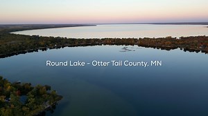 Birds eye view of Round Lake and Otter Tail Lake on a very calm fall evening in Otter Tail County, MN. #lakelife #ottertailcounty #FindYourInnerOtter #Minnesota #travel #autumnvibes #vacation | Otter Tail Lakes Country