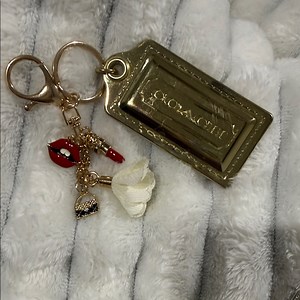 Coach 1941 big Gold Keychain with Red, White, and Black Charms