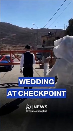 Palestinian groom meets his bride at an ‘Israeli’ checkpoint in the West Bank