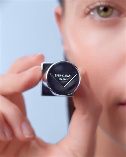 57K views · 627 reactions | Unlock transformative color with micro-blushing technology. Prada Balm in Astral Pink adapts to the pH of the lips to deliver a unique glow, tailored to you. #RethinkingBeauty #PradaMakeup #PradaBeauty | Prada | Facebook