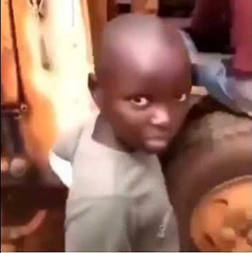 African Kid Gets Flicked In Head