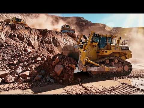 Sculpting Mountains: Epic Fleet of Giant Bulldozers at Work