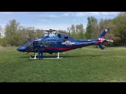 Life Flight Medical Helicopter landing and takeoff- Close up view- Agusta Westland 119
