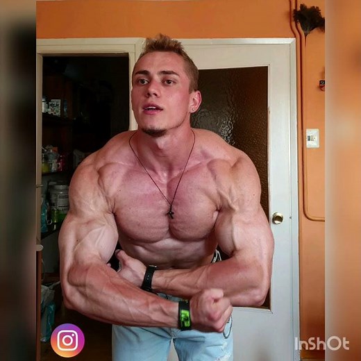 Young bodybuilder Robert Stan pumping incredible hard muscles