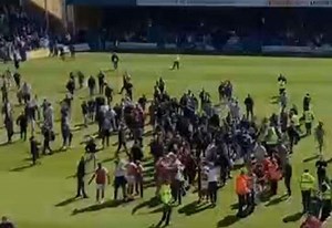 Football hooligans banned for up to 10 years over pitch invasion fights