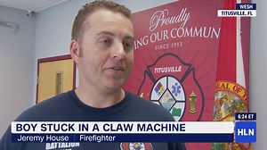 Boy gets stuck in claw machine
