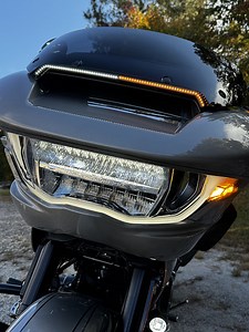 Add bold style and visibility to your new Road Glide with the LED Center Fairing Vent Trim! 72 dual-color LEDs provide a sleek white running light & eye-catching amber turn signals. Choose from 3 turn signal modes for a truly custom look. #customdynamics #reels #harleydavidson #performancelighting #roadglide #newreel | Custom Dynamics Motorcycle LED Lights & Accessories