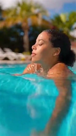 A cute lovely girl swimming in a pool. #lovelygirl #swimmingpool #swimming #beautifulgirl