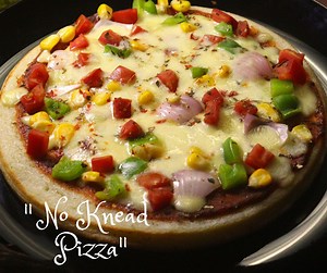 Suji Pizza | Pizza in Pan | Semolina Pizza | Pizza Recipe #SujiPizza #pizzainpan #semolinapizza #pizzarecipe #pizzaislife #panpizza #NoKneadPizza #quickpizza #vegpizza Music :Artlist.io Novembers - Rooftop Galore | Passion2cook