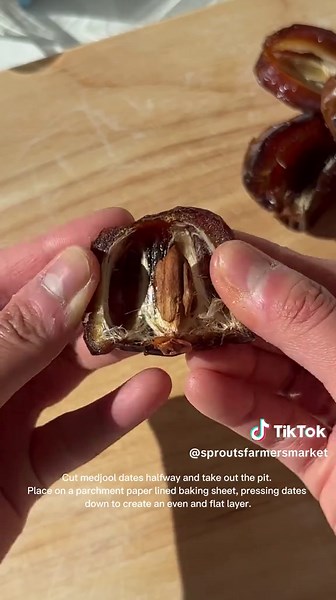 Sweet, crunchy, salty and delicious! Date bark is a wholesome treat you can make with simple ingredients scooped up in the bulk department! 🫙🥰 📸: @healthyeatsbyfi Ingredients: 1 Package of Medjool dates Peanut butter Dark Chocolate Coconut oil Granola Salted roasted peanuts Instructions: 1. Cut dates in half and remove pits. 2. Place dates on a parchment paper-lined baking sheet, pressing dates down to create an even and flat layer. 3. Add a layer of peanut butter and spread evenly. 4. Melt d