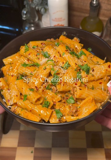 Ingredients * 1 lb rigatoni noodles * ¼ red onion, diced * 2 tbsp minced garlic * 2–3 tbsp chipotle sauce (adjust to taste) * 1 lb chorizo * 16 oz heavy cream * ½ cup grated Parmesan cheese, plus more for serving * ½ cup reserved pasta water * 1 tsp garlic powder * 1 tsp onion powder * Black pepper, to taste * Red pepper flakes, to taste * 2 tbsp fresh cilantro, minced Directions 1. Cook the rigatoni according to the package directions until al dente. Before draining, reserve ½ cup of the pasta 