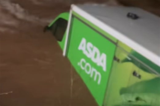 Scary moment Asda delivery van gets trapped in fast-flowing Midland river