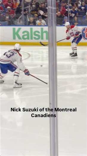 Nick Suzuki Montreal Canadiens feeds Cole Caufield for a strong scoring chance in Game 1