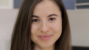 clip-1023559348-dentist-tells-how-properly-care-teeth-girl