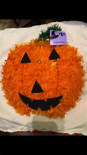 1.2K views · 4 comments | I love how this pumpkin came out! I bought a pumpkin at Family Dollar took the orange garland off and tie on all this fun Fall material! Add a real dried pumpkin stem and attached a wire hanger to the back ! #thetwirlingfeathers #everyone #fallmaterial #PumpkinDecor | The Twirling Feathers | Facebook