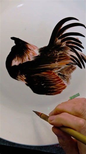 Hand-painted rooster symbolizes good fortune and success