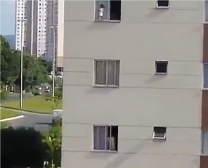Help! Baby climbs out of window and walks on ledge of building