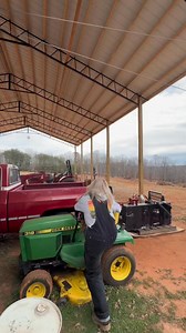 Almost 3 minutes of me fighting this ol John Deere just to move it so I can rearrange under the barn. Not sure who that backfire scared worse — me or the horses. 😅 I swear I’m gonna work on it soon… lmao | Rust Ridge Ranch L.L.C