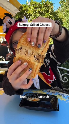 out of all the holiday food, I’ve had I think this bulgogi grilled cheese sandwich with corn cheese soup might be top 3 of all time for creativity & taste for me @Disney Parks #disneyland #disneyfoodie #disneyfood #mukbang #grilledchesse #sandwich #disneyland #tastetest #foodadventure #bulgogi