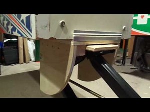 RV jack with custom cradle to lift your pinball cabinet