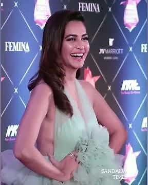 Kirti kharbanda visible side boobs hot dress in femina event shows her hotness